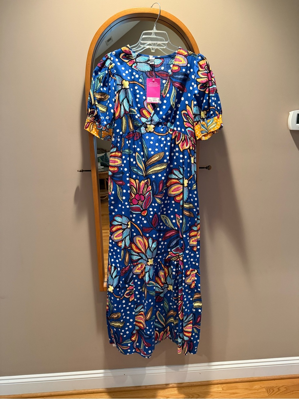 Blue Floral Maxi Dress with Puff Sleeves. Side zipper for easy fit and pockets.